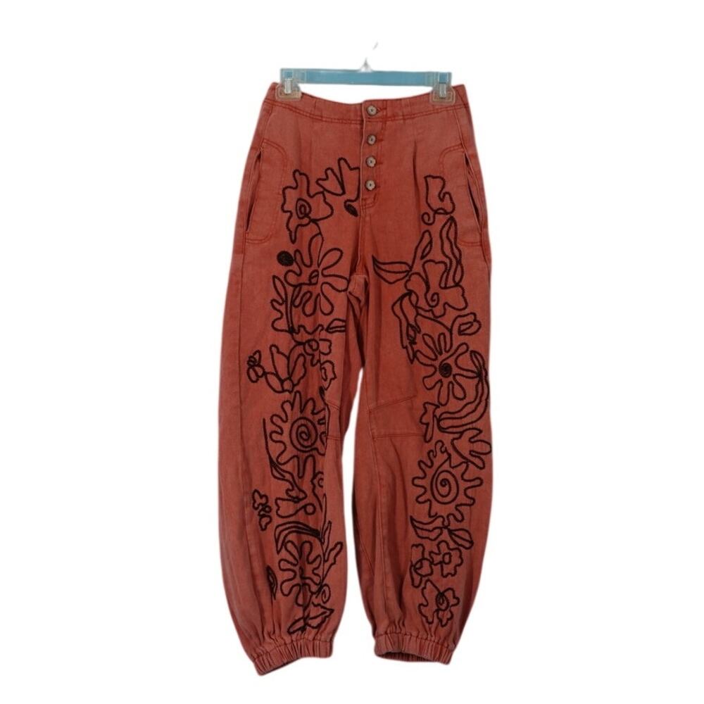 POL Burnt Orange Wide Leg Pants with Black Floral Outline